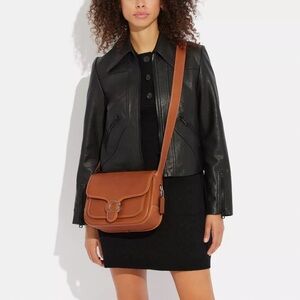 ISO Coach Tabby Messenger